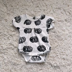 Kate Quinn pumpkin onesie